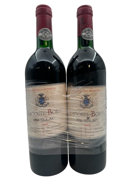 Zwei Flaschen Lacoste Borie Pauillac Rotwein aus dem Jahr 1985 aus der Region Bordeaux